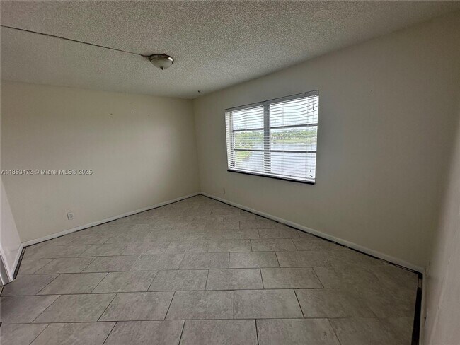 Building Photo - 8710 N Sherman Cir