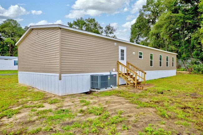 Building Photo - 8595 NW 13th Ct