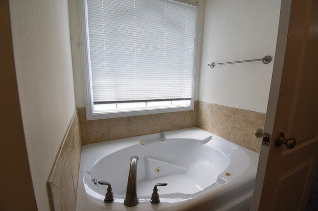 Building Photo - Coming Soon!! 4 Bedroom 2.5 Bath Nicely Renovated with Updated Fixtures! - No Pets