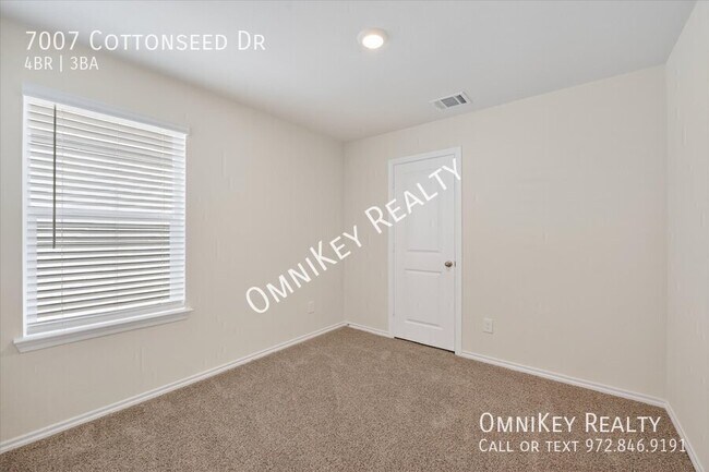 Building Photo - 7007 Cottonseed Dr