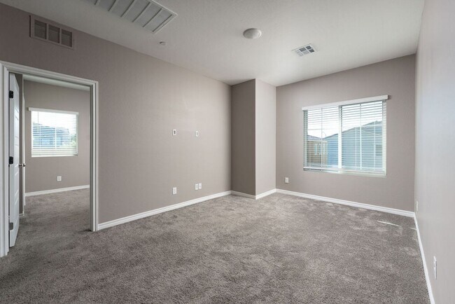 Building Photo - Modern Henderson Townhome with Loft & Resort-Style Amenities