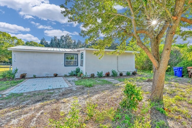 Building Photo - 6375 86th Ln