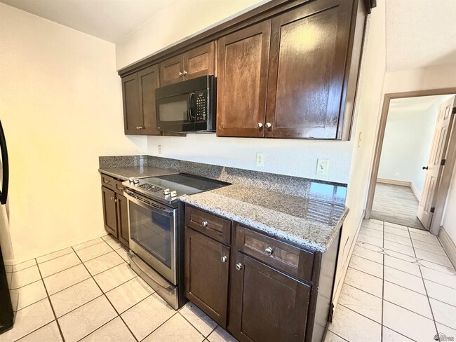 Building Photo - 4584 W 18th Pl
