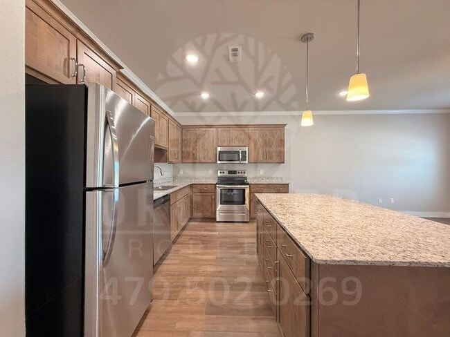 Building Photo - EP 6 | Townhome with Garage in Siloam Springs!