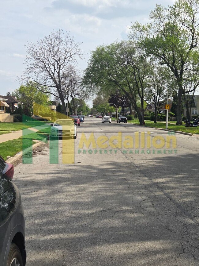 Building Photo - Spacious 6-Bedroom Home with Finished Basement and Backyard