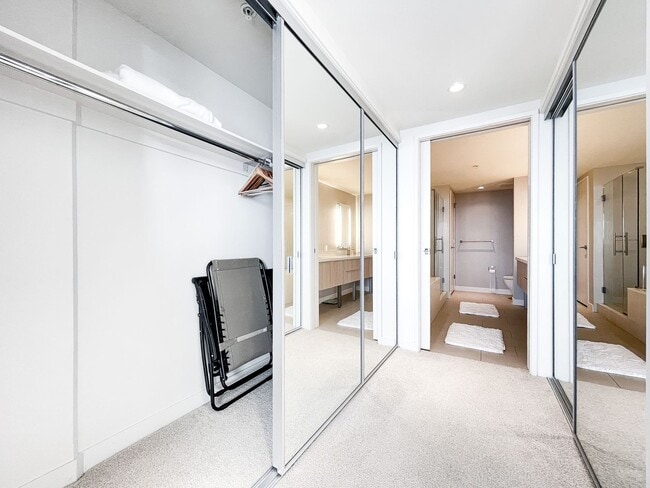 Building Photo - Furnished Symphony Condo with Direct Ocean Views and Two Parking