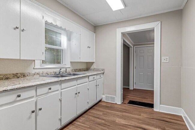 Building Photo - Adorable Home, Just Painted, Wood Flooring...