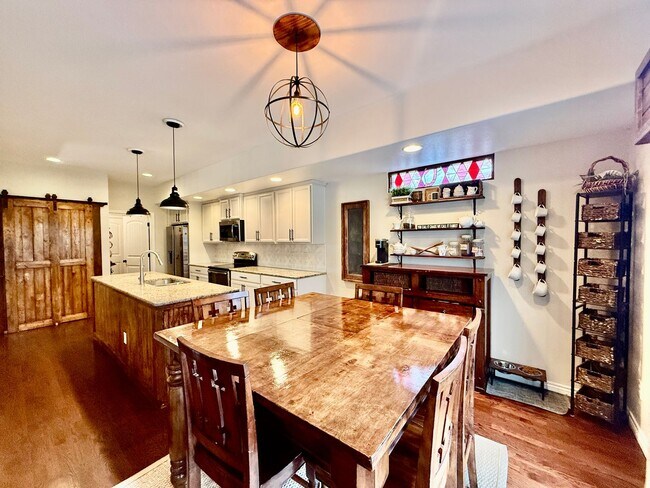 Building Photo - Spacious & Stylish 5-Bedroom Home in Wolf ...