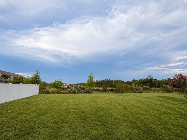 Building Photo - Spacious Living Overlooking a Serene Pond
