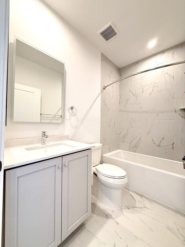 Building Photo - Brand new 4 level, 4 Bedroom Townhome with Elevator!