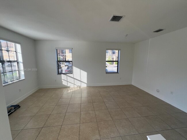 Building Photo - 9399 W 33rd Ln