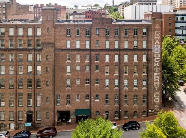 Building Photo - Downtown Studio at Riverviews — Exposed Brick & City Views