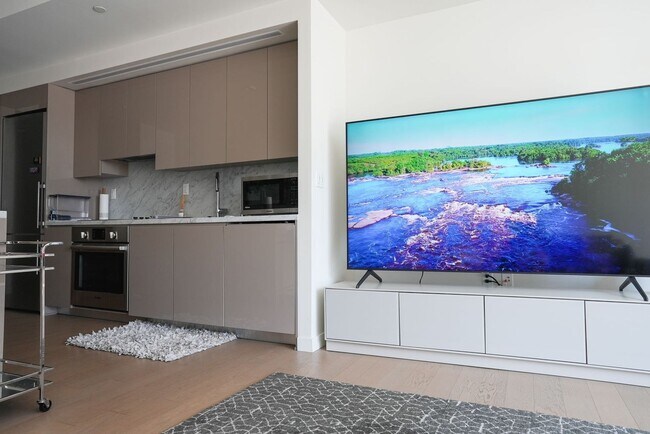 Building Photo - Luxurious Jewel high-rise condo unit; FULL...