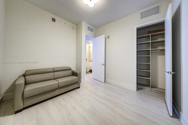 Building Photo - 10203 Collins Ave