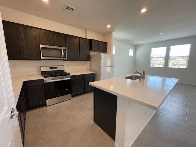 Building Photo - Coming Soon-2 Story Townhome Ready for new tenant on 6/15/2026!