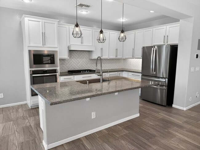 Building Photo - Stunning 5 Bed/5Bath Home in Gated Community – Over 3,100 SqFt of Modern Living -New Carpet throu...