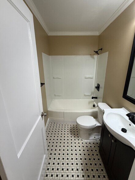 Black and White Tile Floor - 18 Waters Ave