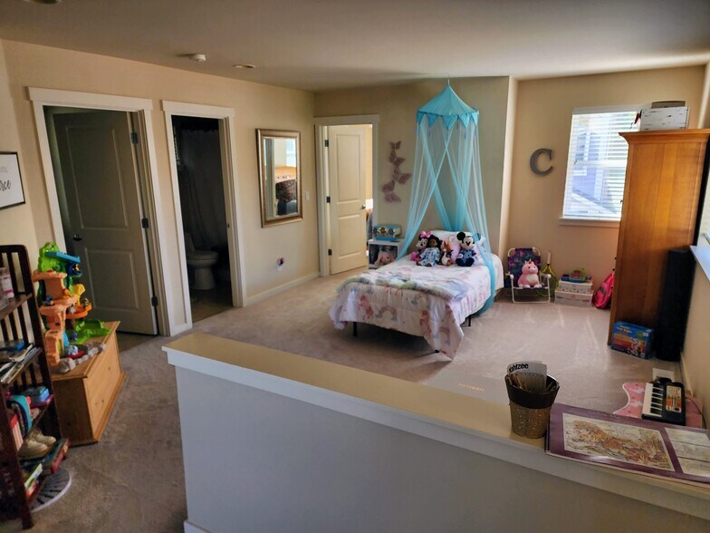 Living space outside Master bedroom - 562 Alpine Ridge Pl NW