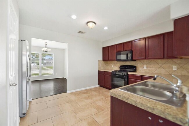 Building Photo - 9820 Lace Flower Way