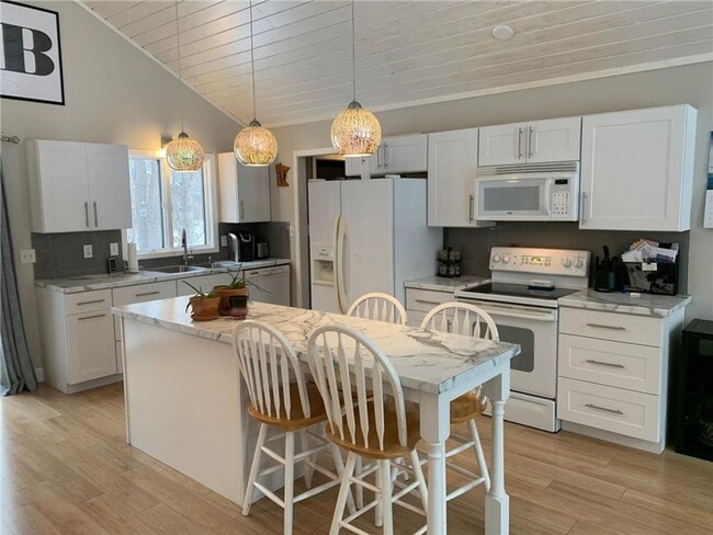 Building Photo - 4 Bedrooms, 2 Bathrooms Single Family Home in Baxter, MN 2 car garage, on a large corner lot