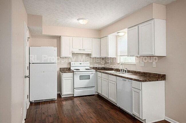Building Photo - 7179 Feather Ct