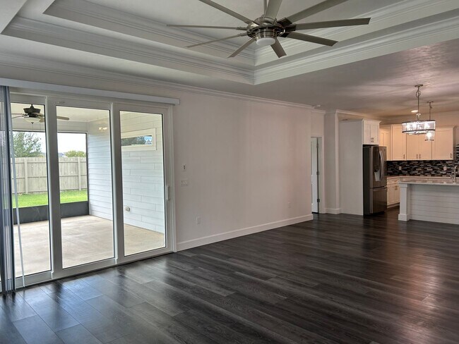 Building Photo - Immaculate 3/2 with Yard, Garage, and Pet ...