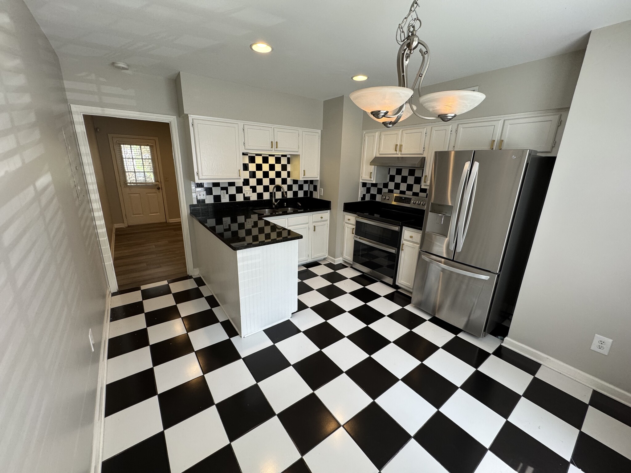 Renovated kitchen with new stainless steel appliances - 2312 18th Ave S