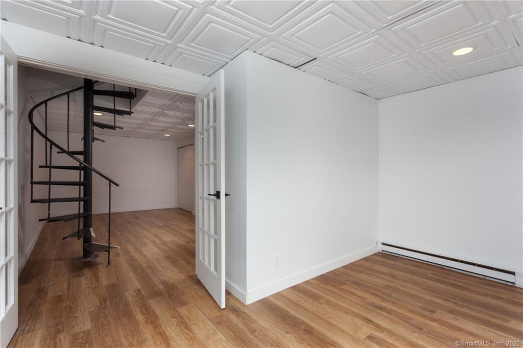 extra room separated by French doors. Also has glass sliders that lead to patio - 188 Flax Hill Rd