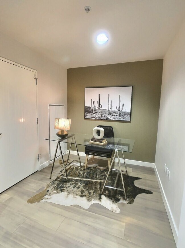 Building Photo - Gorgeous 1 Bedroom Condo at Axis with Den