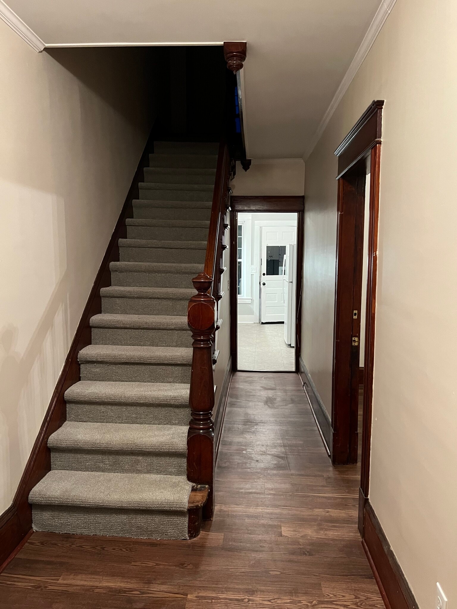 Front hall stairs looking toward kitchen - 8 Grove St