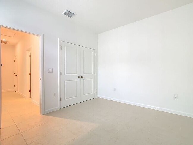 Building Photo - New Luxury Townhome in Celebration, FL Corner unit. All porcelain tiled floors. Aleutian model by...