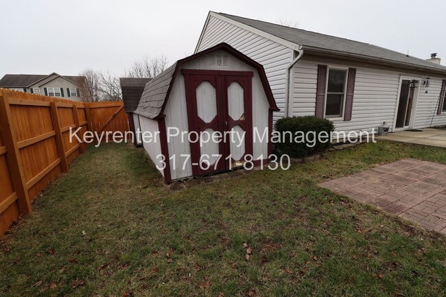 Building Photo - Discover this well-maintained 3-bedroom, 2-bath home in Indianapolis featuring an attached garage...
