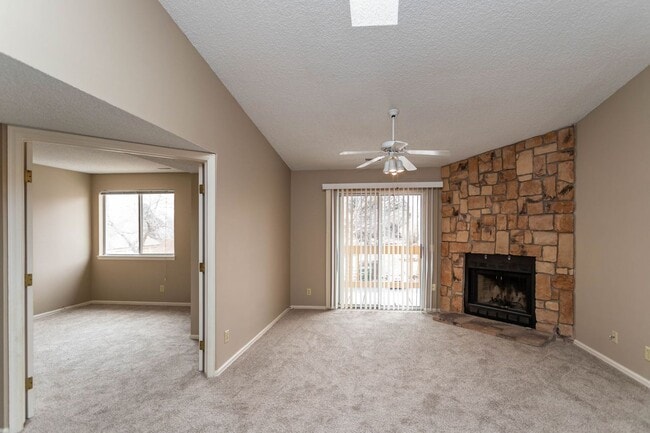 Building Photo - Cozy 2-Bed Condo with Fireplace, Garage & Pool Access Near Shopping!