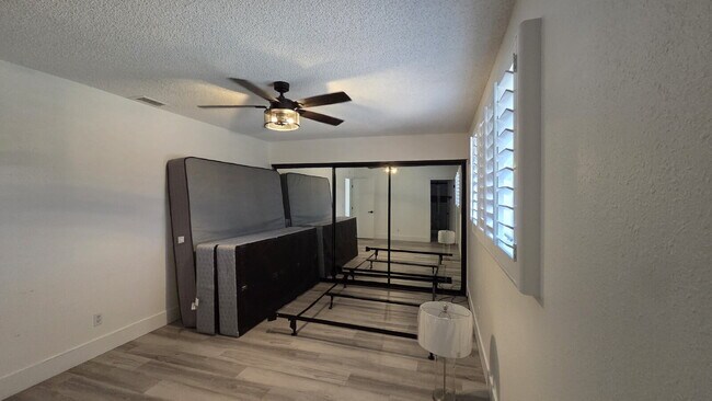 Building Photo - Beautifully remodeled pool home situated on a spacious quarter-acre lot