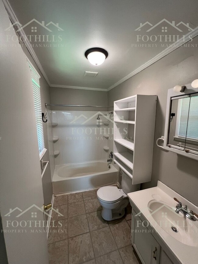 Building Photo - 3 Bedroom Home with Fenced Yard & Carport ...
