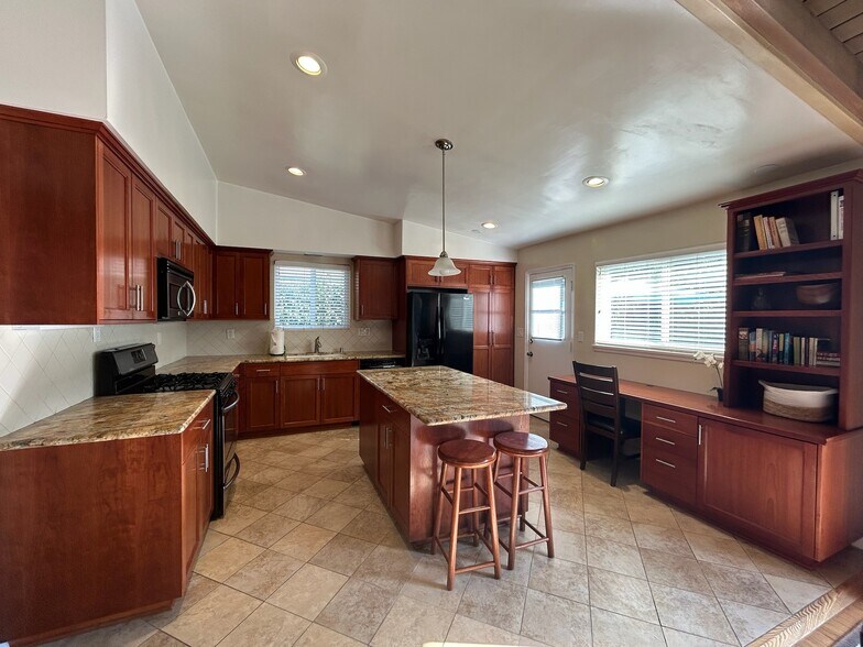 Kitchen with view of built-in desk - 5835 Babbitt Ave