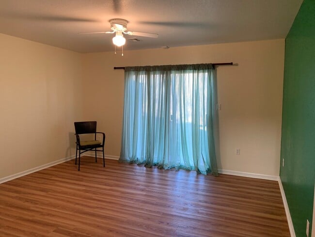 Building Photo - ALL WOOD FLOORS, LARGE BEDROOMS AND EXTRA STORAGE!