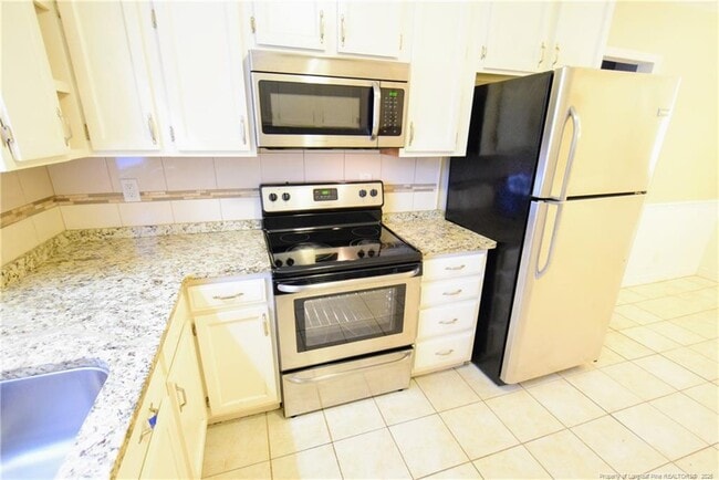 Building Photo - 6604 Bonnie Bell Ln