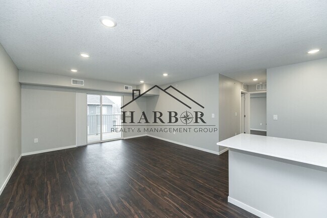 Building Photo - Brand NEW Caroline Apartments 201 -  Move ...