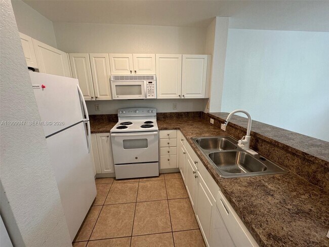 Building Photo - 1690 NE 33rd Ave