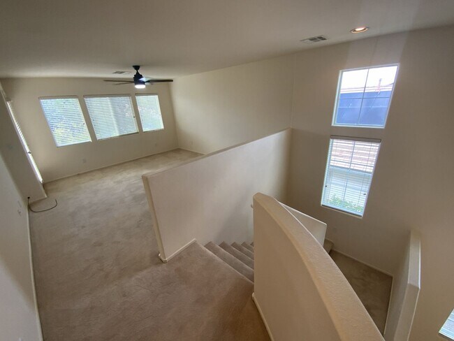 Building Photo - 4 bedrooms and 2.5 bathrooms 2-story home located in Henderson, NV!