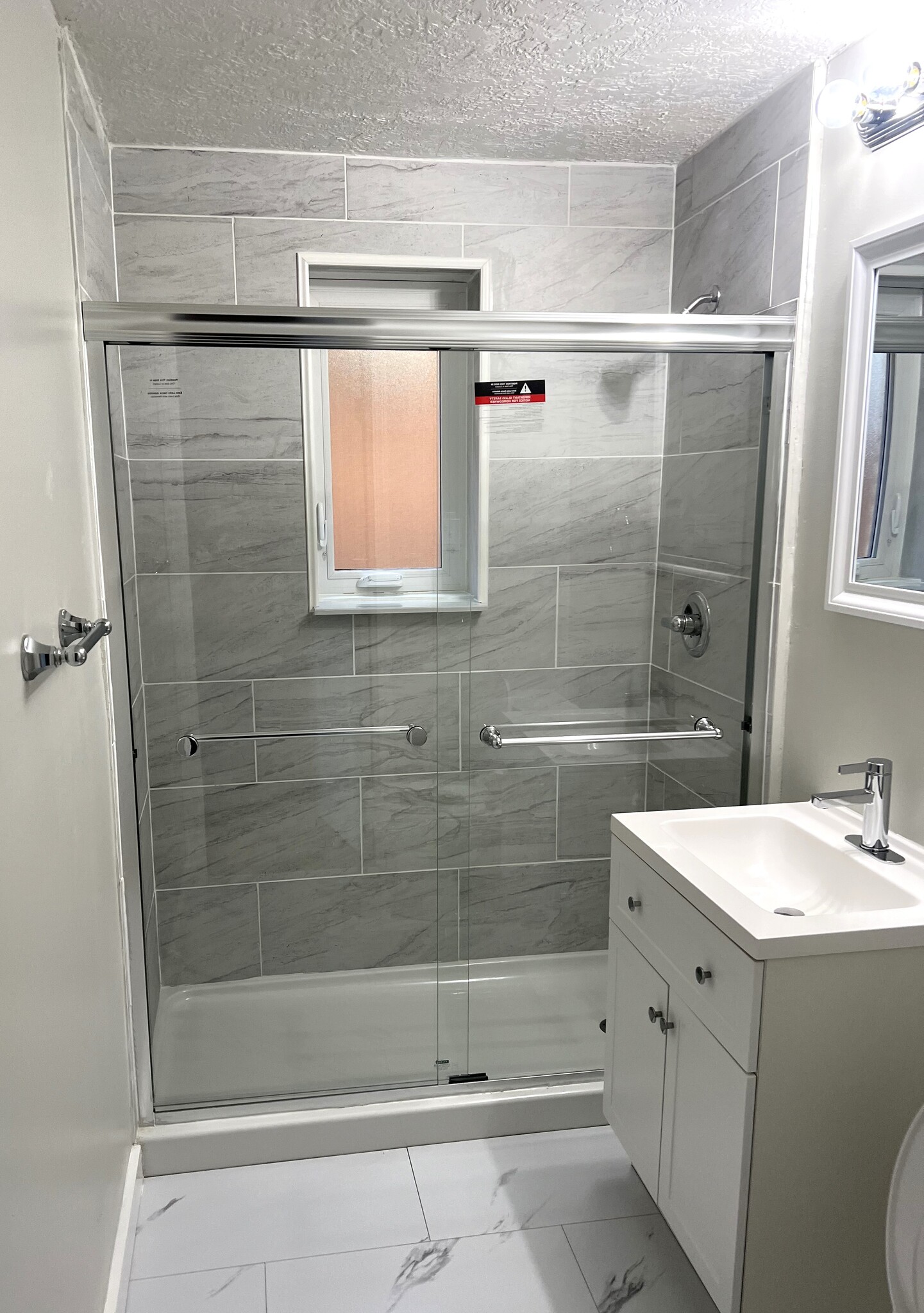 All brand new bathroom interior - walk in shower new! - 101 Braun St