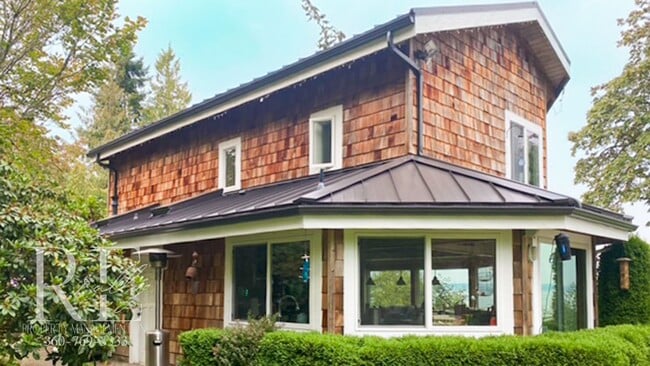 Building Photo - Waterfront Rustic Retreat with Vaulted Ceilings, Picture Windows & Lofted Nook