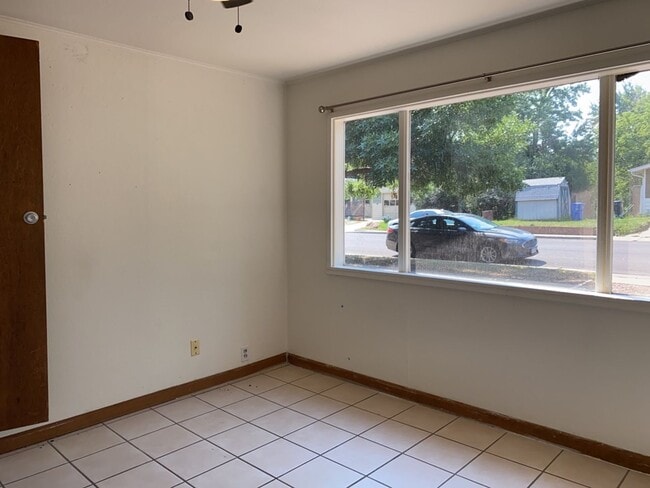 Building Photo - STUDENTS WELCOME! Cute 4-Bedroom / 1-Bath Home w/ Spacious Fenced Yard