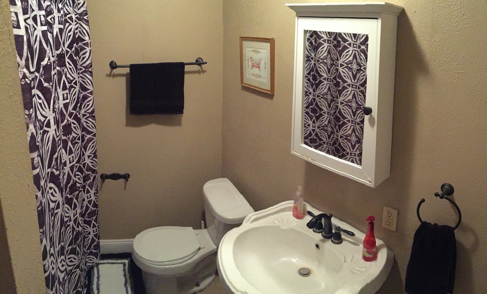 The shared full bathroom. - 1525 South 7th Street