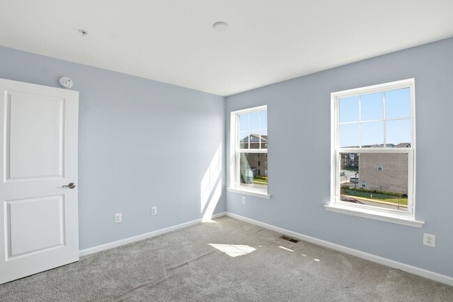 Building Photo - Experience refined, contemporary living in this nearly new residence designed for both comfort an...