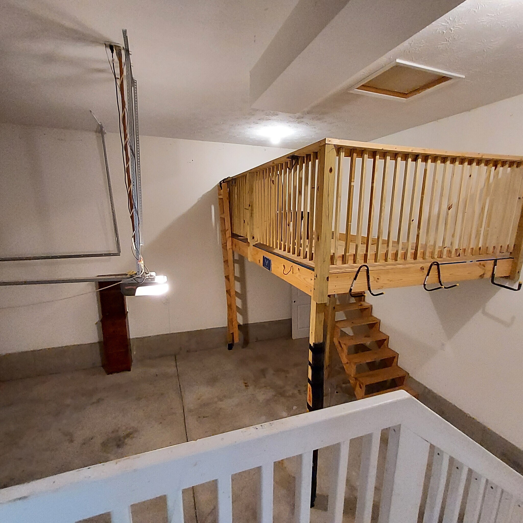 2 car garage with opener and mezzanine - 1238 Freedom Pt