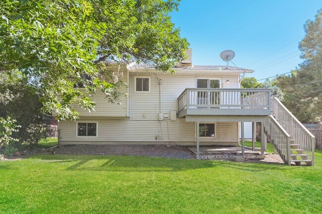 Building Photo - "Charming 4-Bedroom Home with 2 Full Baths...