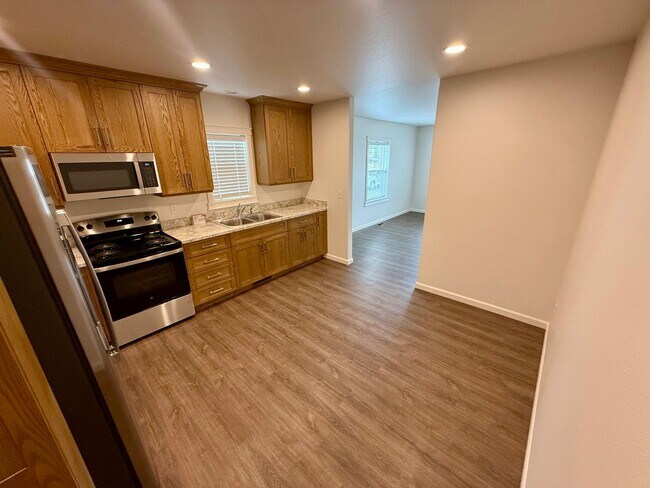 Building Photo - Spacious 4-Bedroom Home with Detached Garage & Large Yard in Clarkston