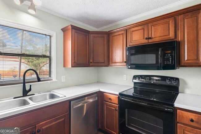 Building Photo - 2051 College Ave NE